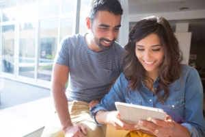 Couple looking at an ipad