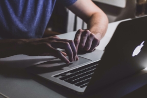 Man using a mac laptop